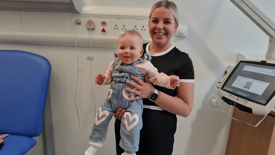 Mum Leona is pictured with her daughter, Hollie-mae, the first baby to take part in the trial.